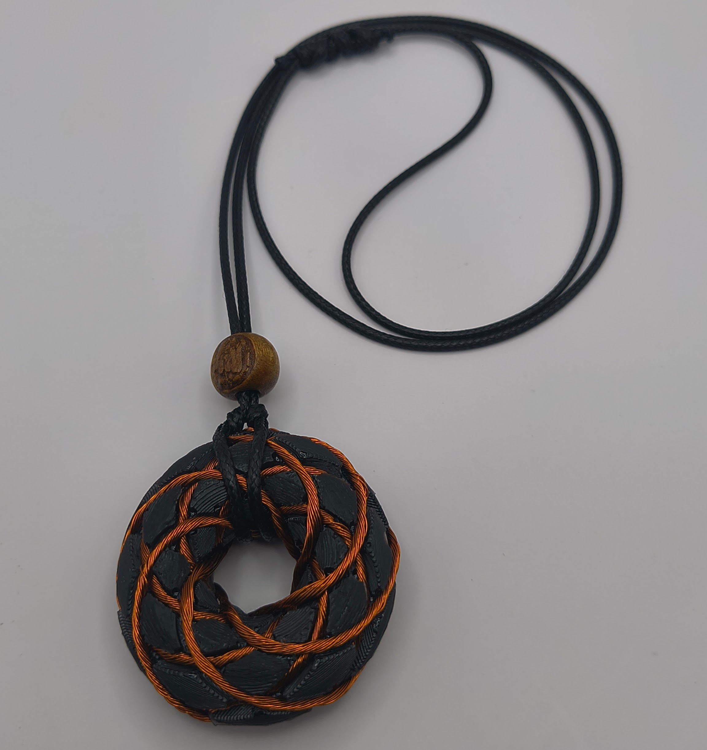 Flower of Life Torus Rodin coil pendant, Genuine Shungite.